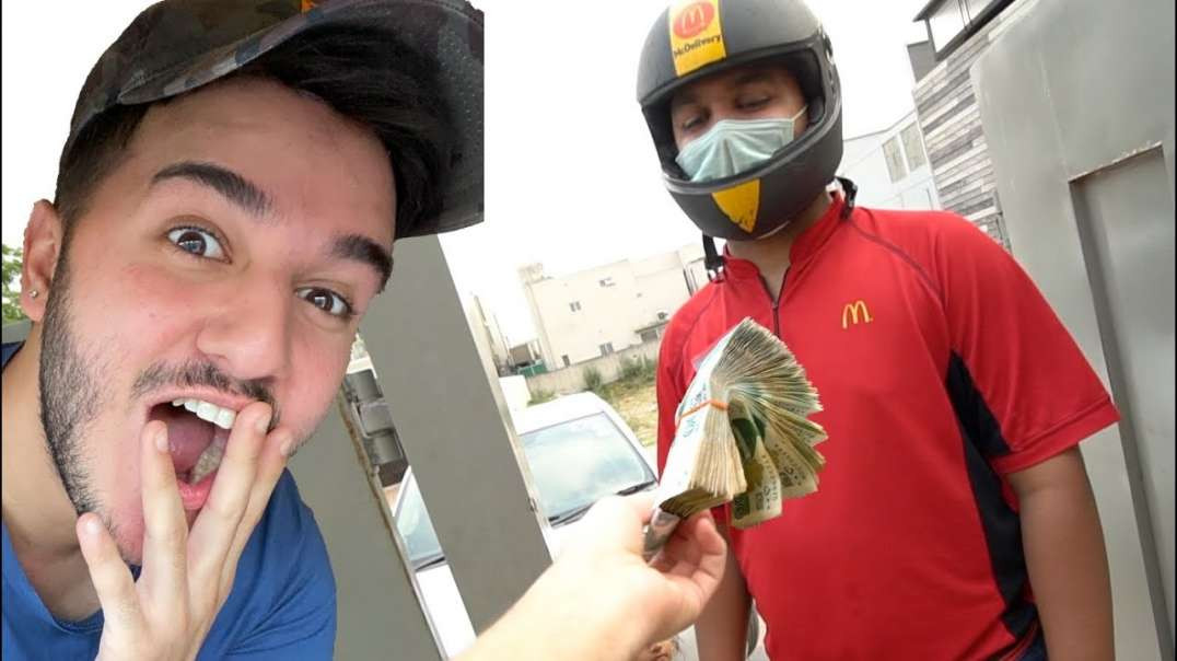 PAKISTAN GIVING 100-000 TIP TO DELIVERY GUY