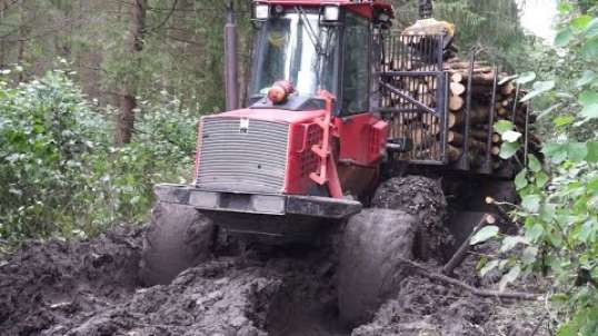 Valmet 840.3 logging in rainy summer forest big load